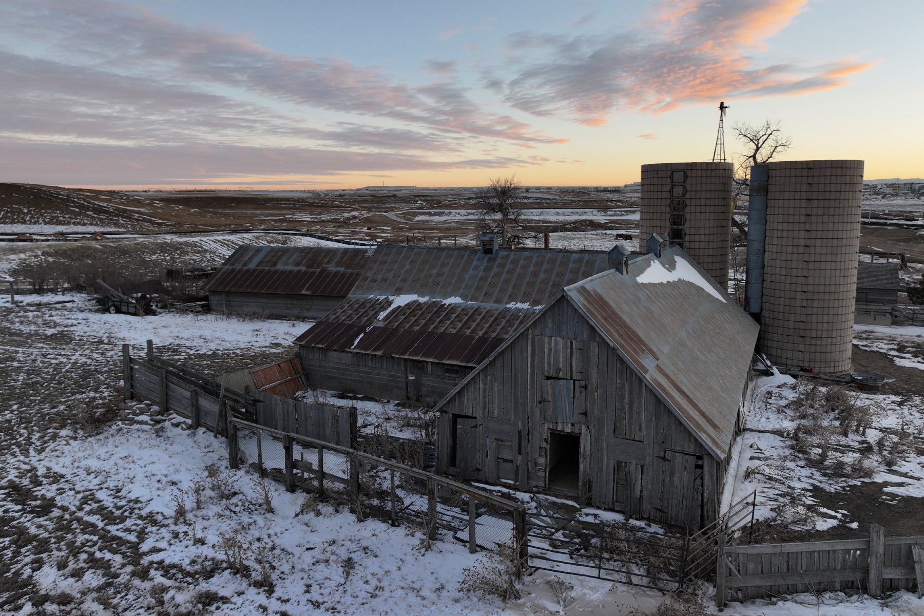 The original homestead barn and outbuildings under fresh snow on the eastern Colorado plains